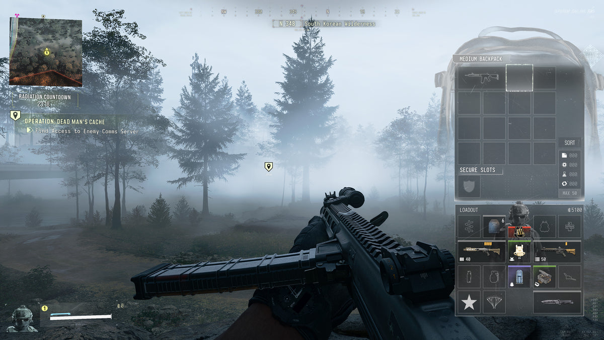 The backpack screen open during a run in a foggy forest