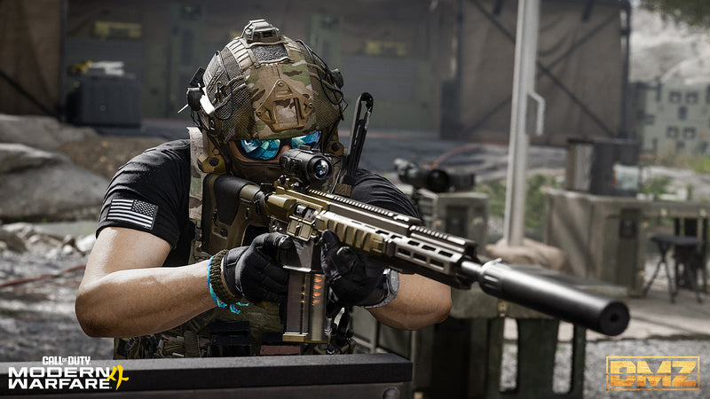 An Operator aiming a scoped rifle