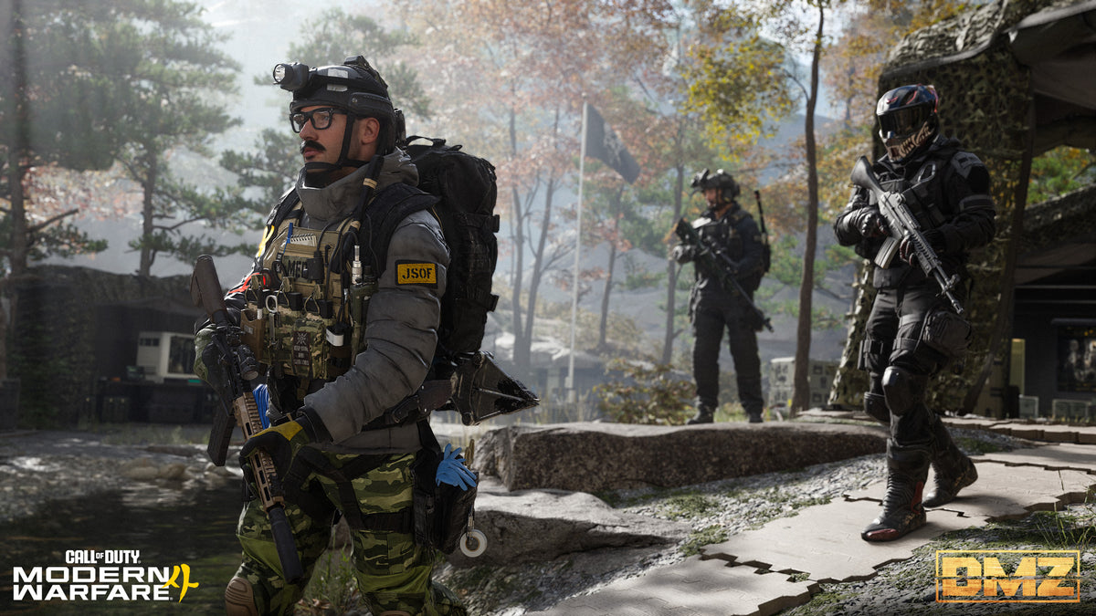 Two Operators gear up at the FOB in the woods