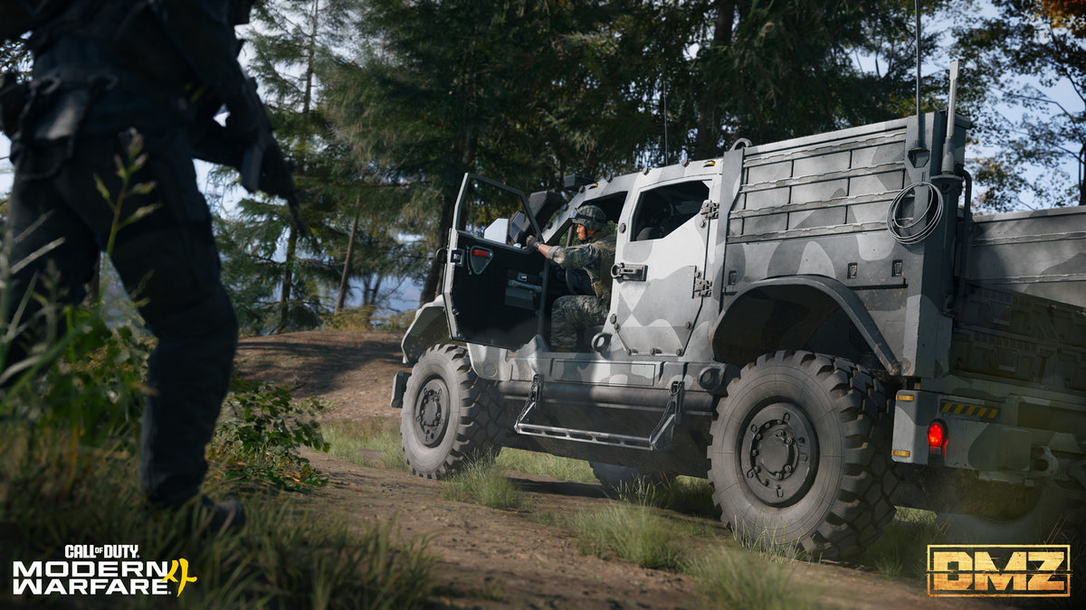 An Operator searches an armored truck in the woods