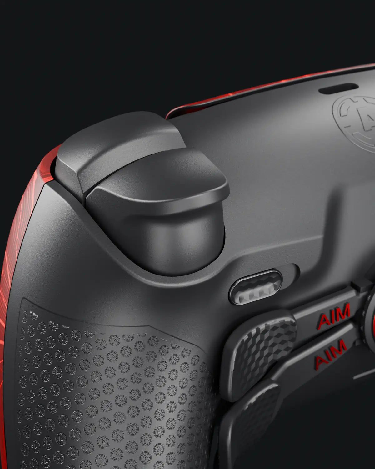 The right trigger with its travel slider just below it on the back